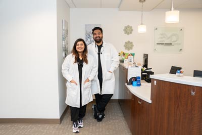 Smiling professionals at desk